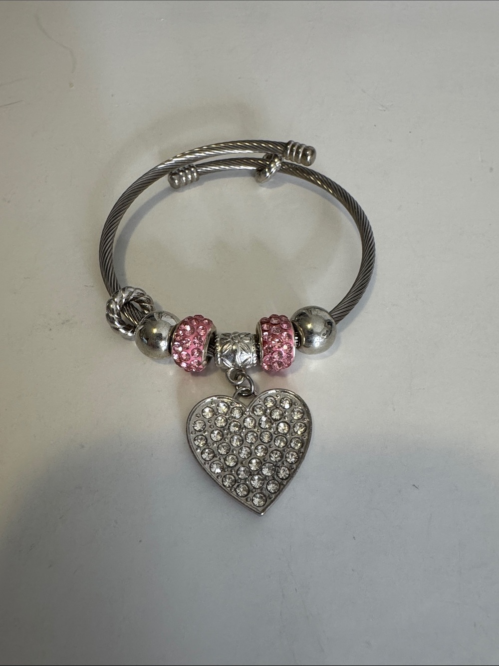 Silver Heart Charm Bangle with Pink Crystal Accents